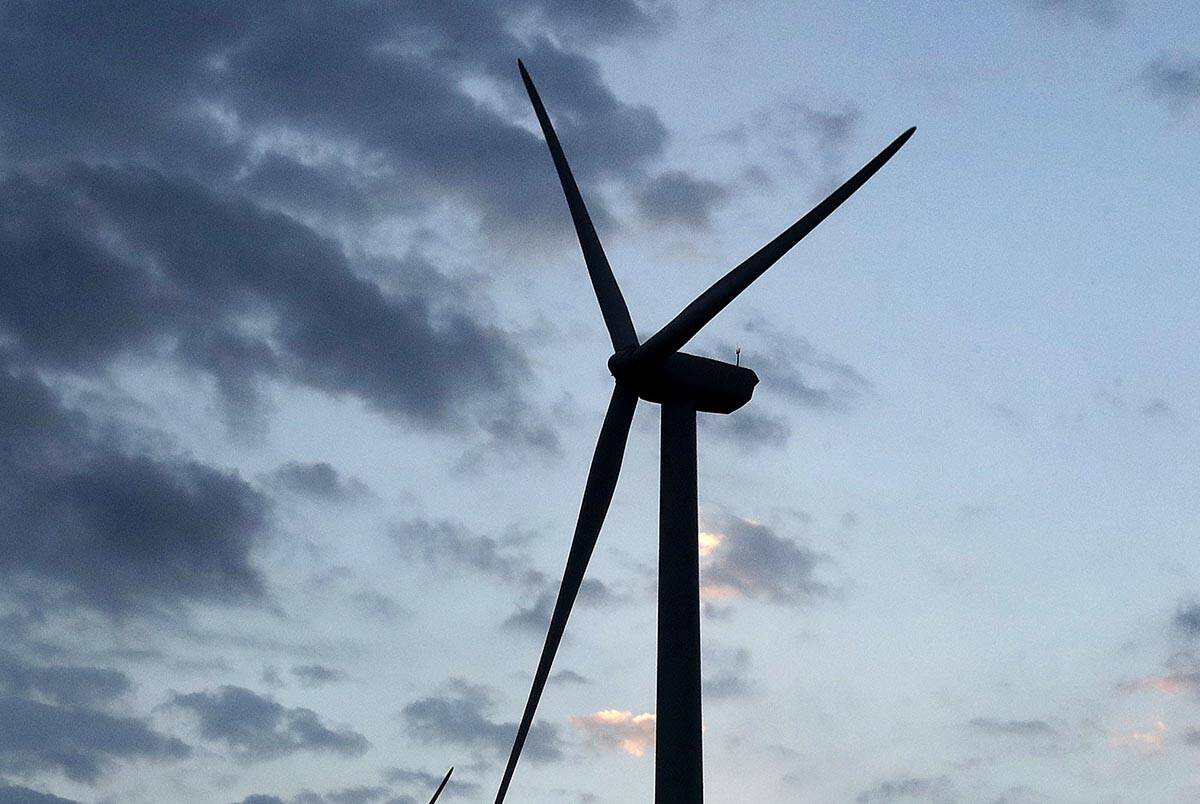 FILE - In this June 1, 2017, file photo, wind turbines, which are part of the Lost Creek Wind F ...