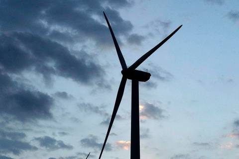 FILE - In this June 1, 2017, file photo, wind turbines, which are part of the Lost Creek Wind F ...