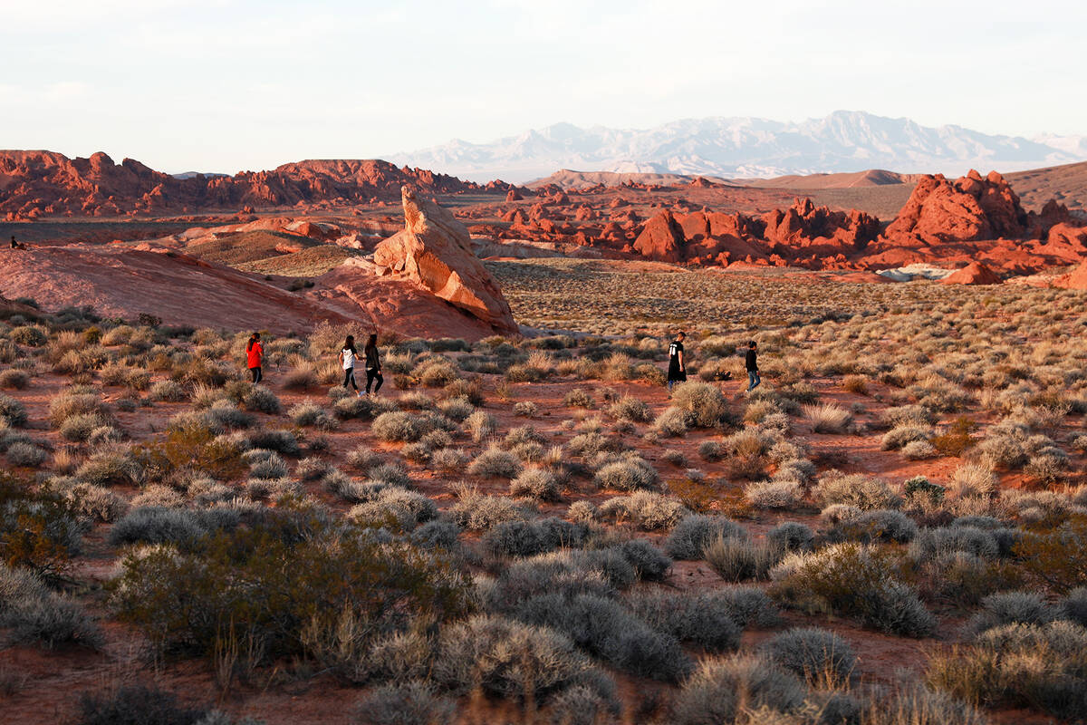 People soak in the view at the Valley of Fire State Park on Sunday in Overton, Nevada, Feb. 4, ...