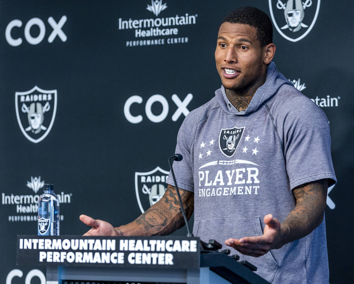 Raiders tight end Darren Waller talks during minicamp practice at the Raiders headquarters with ...