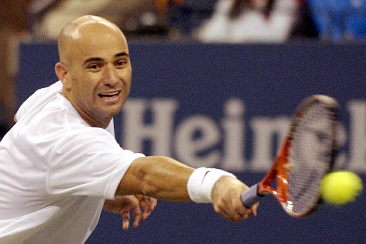 Las Vegan Andre Agassi is shown Tuesday, Sept. 2, 2003. (AP Photo/Elise Amendola)