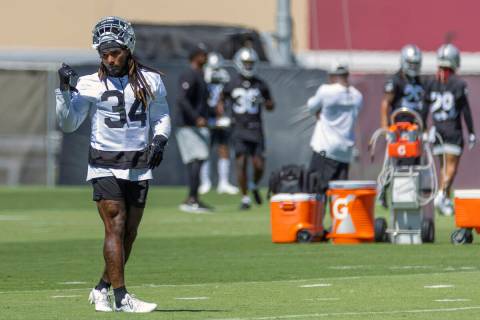 Raiders running back Brandon Bolden (34) looks to a coach during minicamp practice at the Raide ...