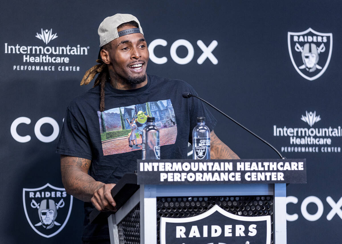 Raiders running back Brandon Bolden (34) listens to a media question during minicamp practice a ...