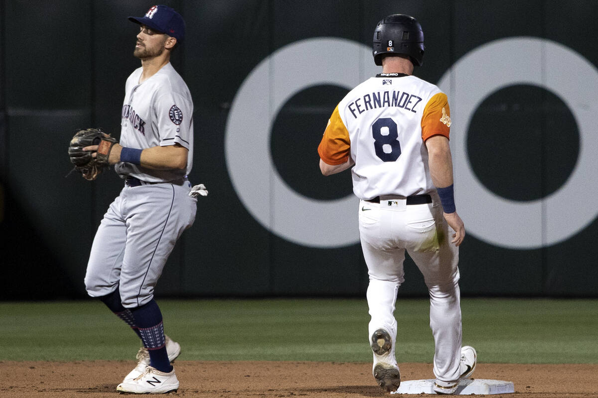 Las Vegas Aviators outfielder Vince Fernandez (8) steals second base during a minor league base ...