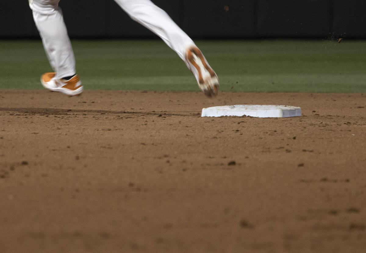 A Las Vegas Aviators player rounds second base during a minor league baseball game against the ...