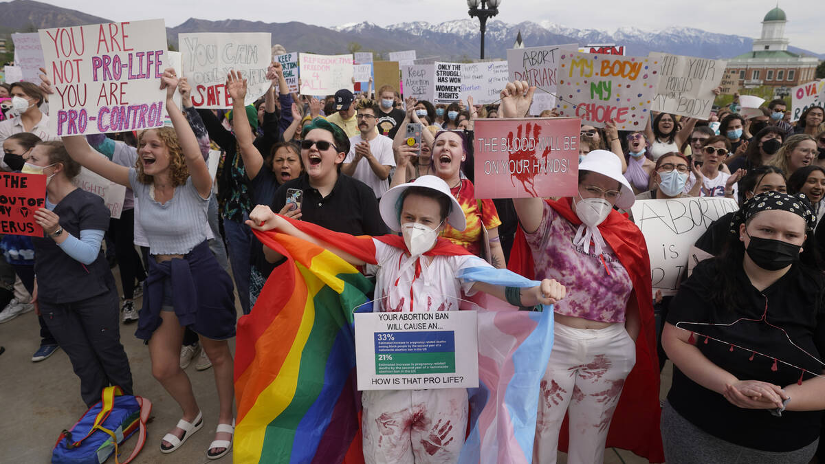 In this May 5, 2022, file photo, people attend an abortion-rights rally at the Utah State Capit ...