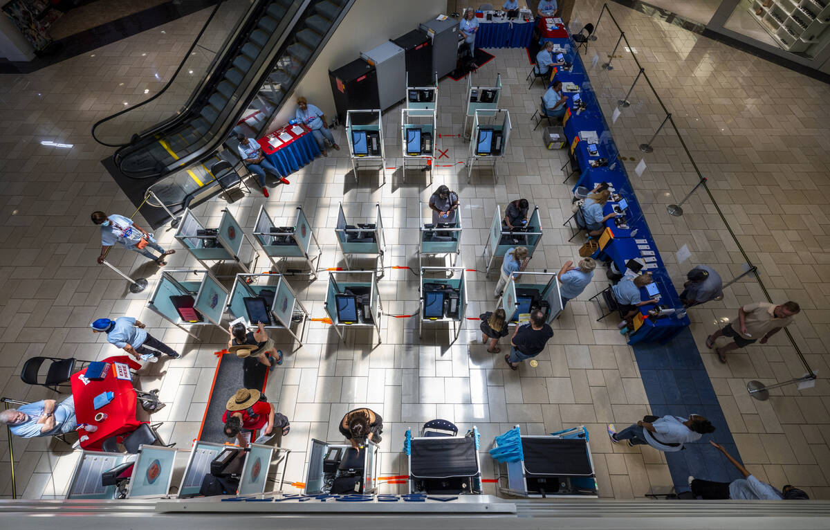 Area residents participate in the last day of early voting for the 2022 primaries at Meadows Ma ...