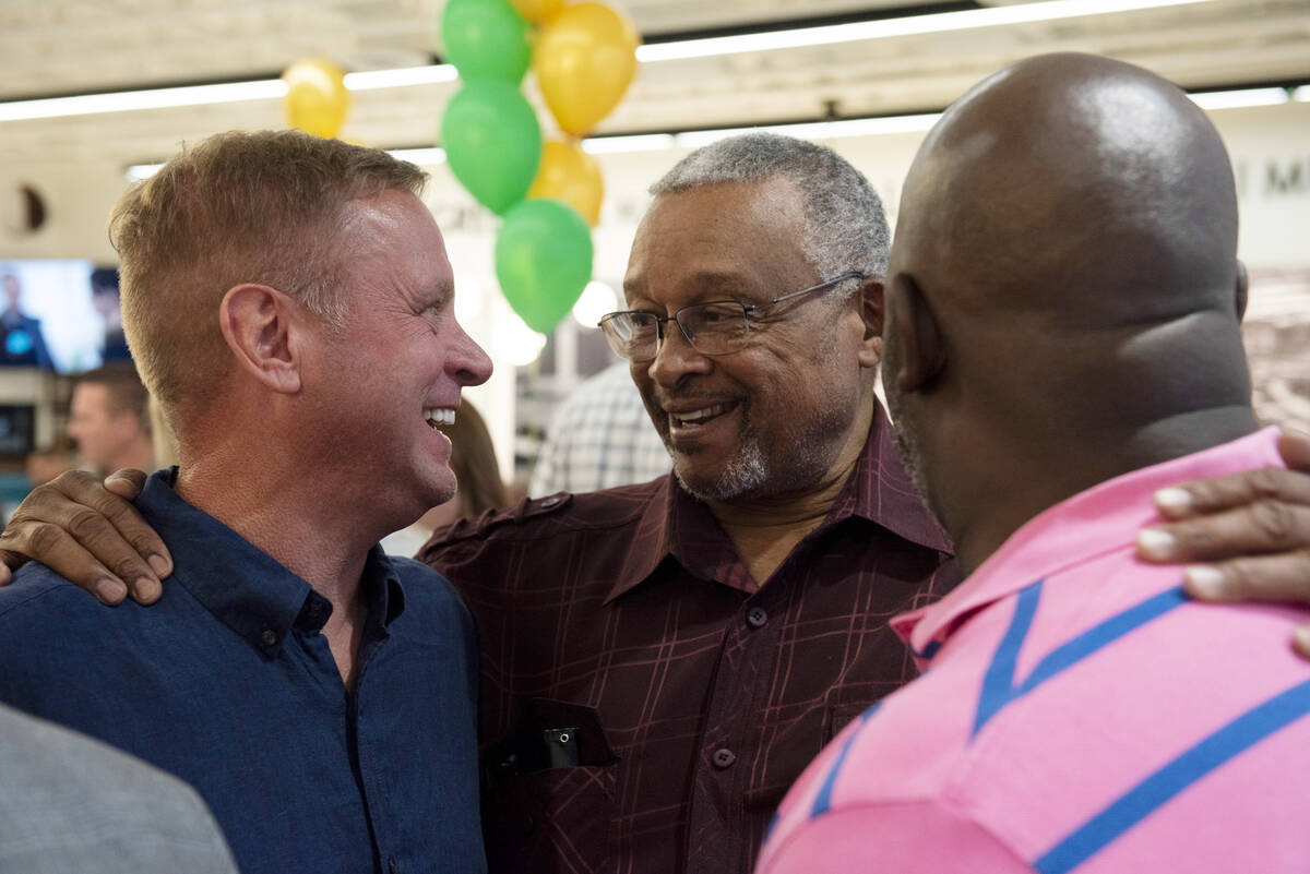 Kevin McMahill, from left, Willie Cherry, and M. Christopher Brown talk during McMahill's elect ...