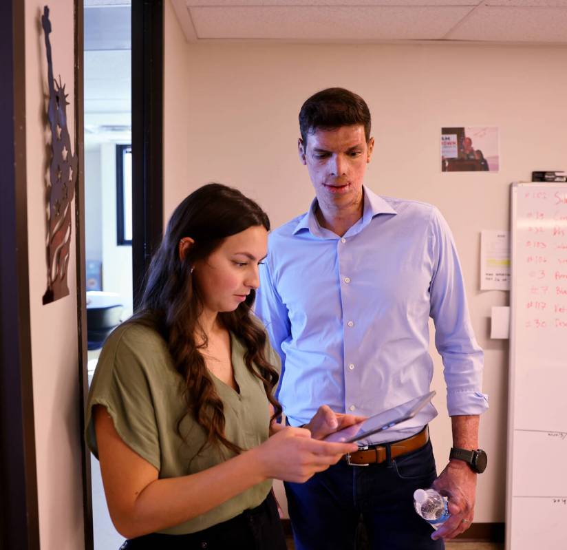 Army veteran and Republican U.S. Senate candidate Sam Brown meets with campaign staffer Nikolet ...