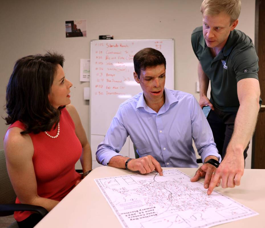 Army veteran and Republican U.S. Senate candidate Sam Brown, center, his wife Amy and volunteer ...