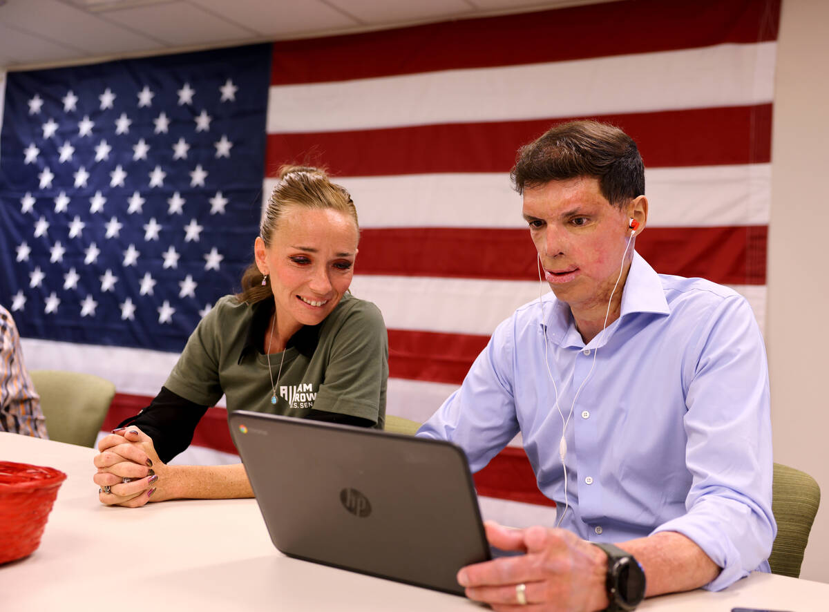 Army veteran and Republican U.S. Senate candidate Sam Brown makes primary election day calls wi ...