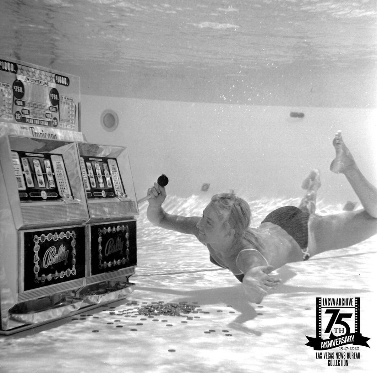 A model posed underwater to play a slot machine in the pool at the Tropicana April 24, 1969. Th ...