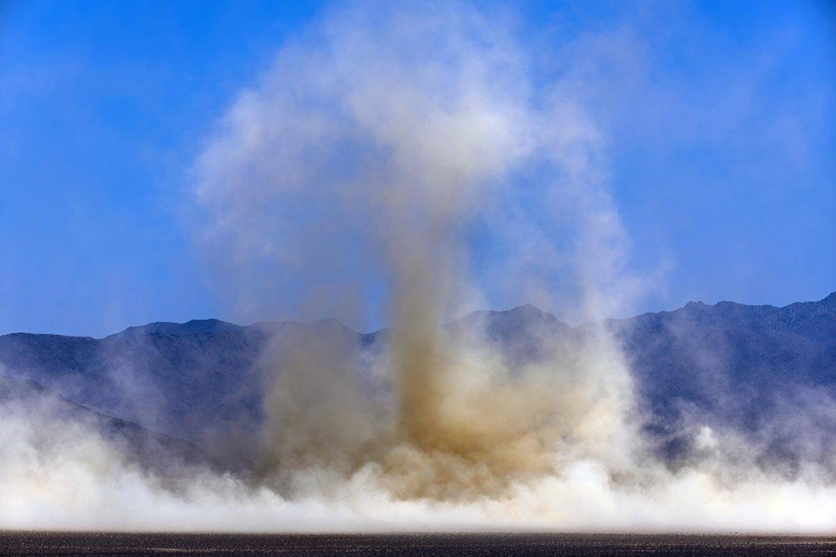 Giant dust clouds are coming off of the dry lake bed while high winds and temperatures continue ...