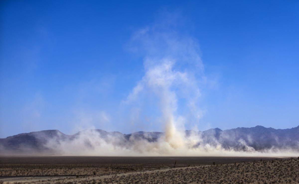 Giant dust clouds are coming off of the dry lake bed while high winds and temperatures continue ...