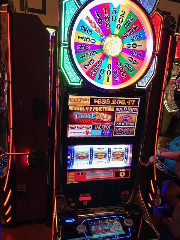 Wendy P, visiting from Kauai, Hawaii, bet $1.25 Friday to hit a “Wheel of Fortune” Triple G ...