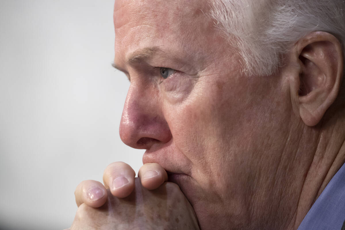 FILE - Sen. John Cornyn, R-Texas, listens to testimony during a Senate Intelligence Committee h ...