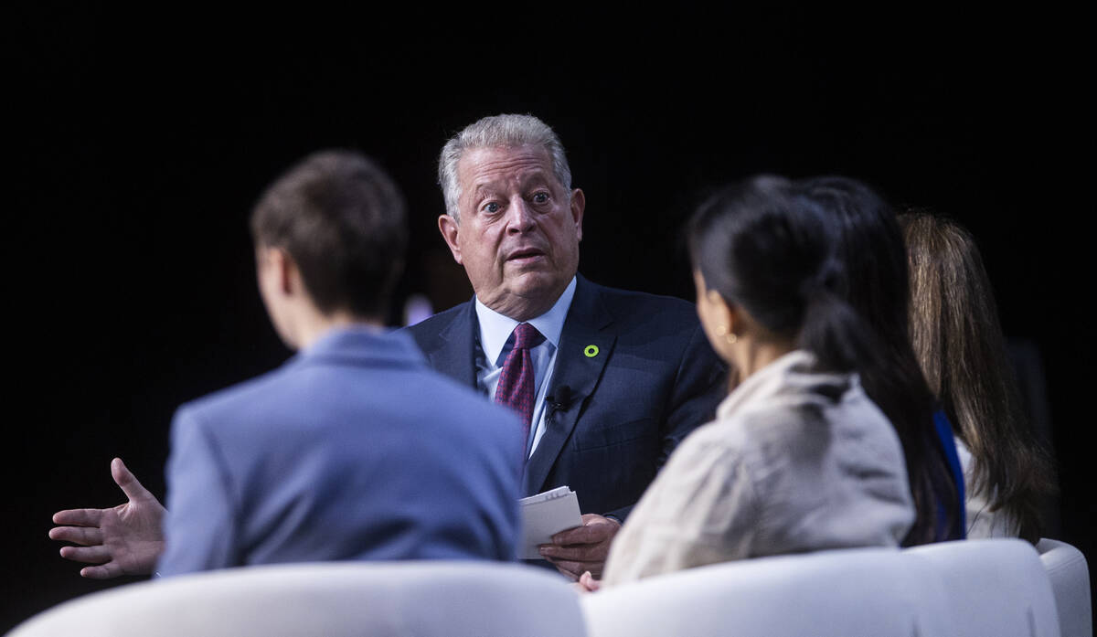 Former vice president Al Gore, middle, founder and chairman of The Climate Reality Project, spe ...