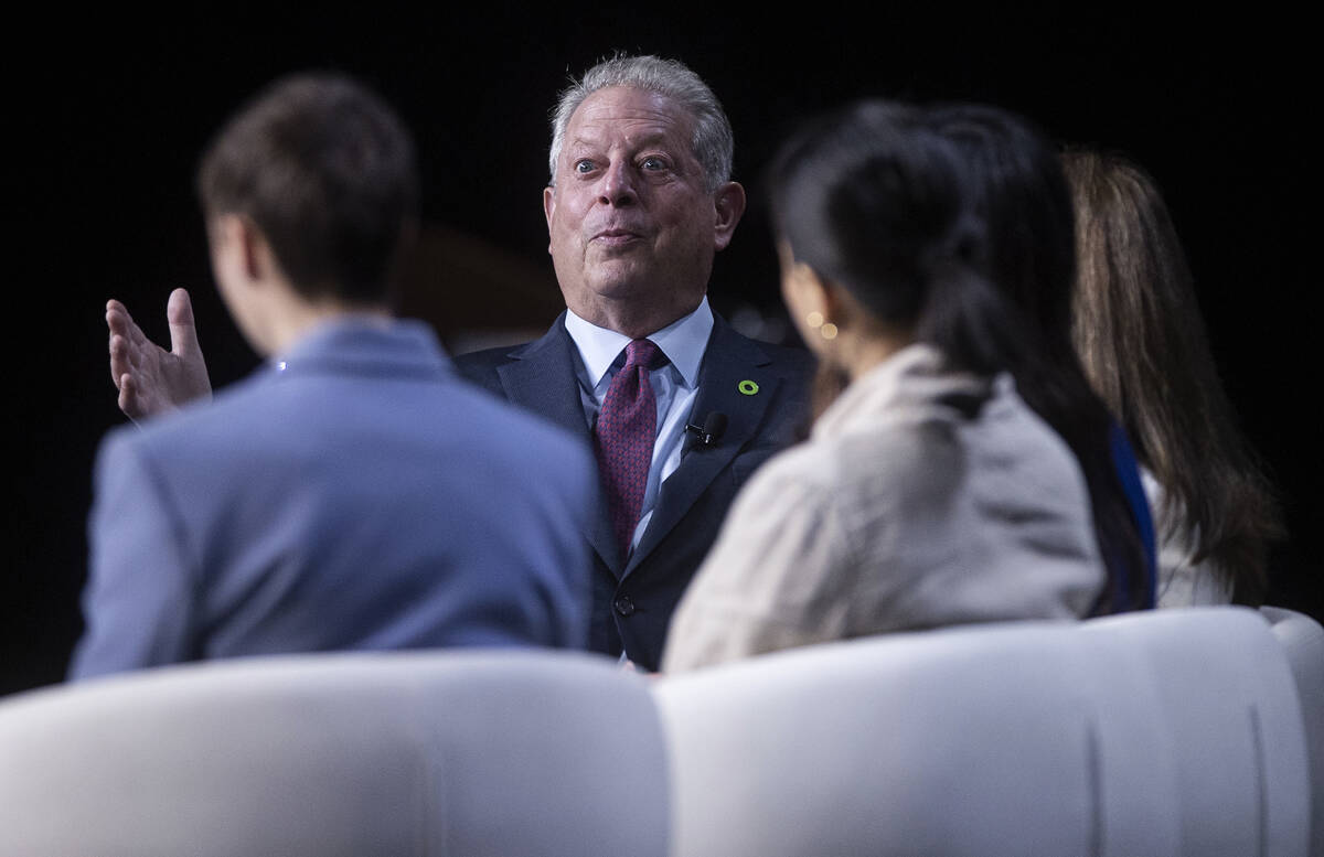 Former vice president Al Gore, middle, founder and chairman of The Climate Reality Project, spe ...