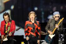 FILE - Ronnie Wood, left, Mick Jagger, center, and Keith Richards, of the Rolling Stones play o ...