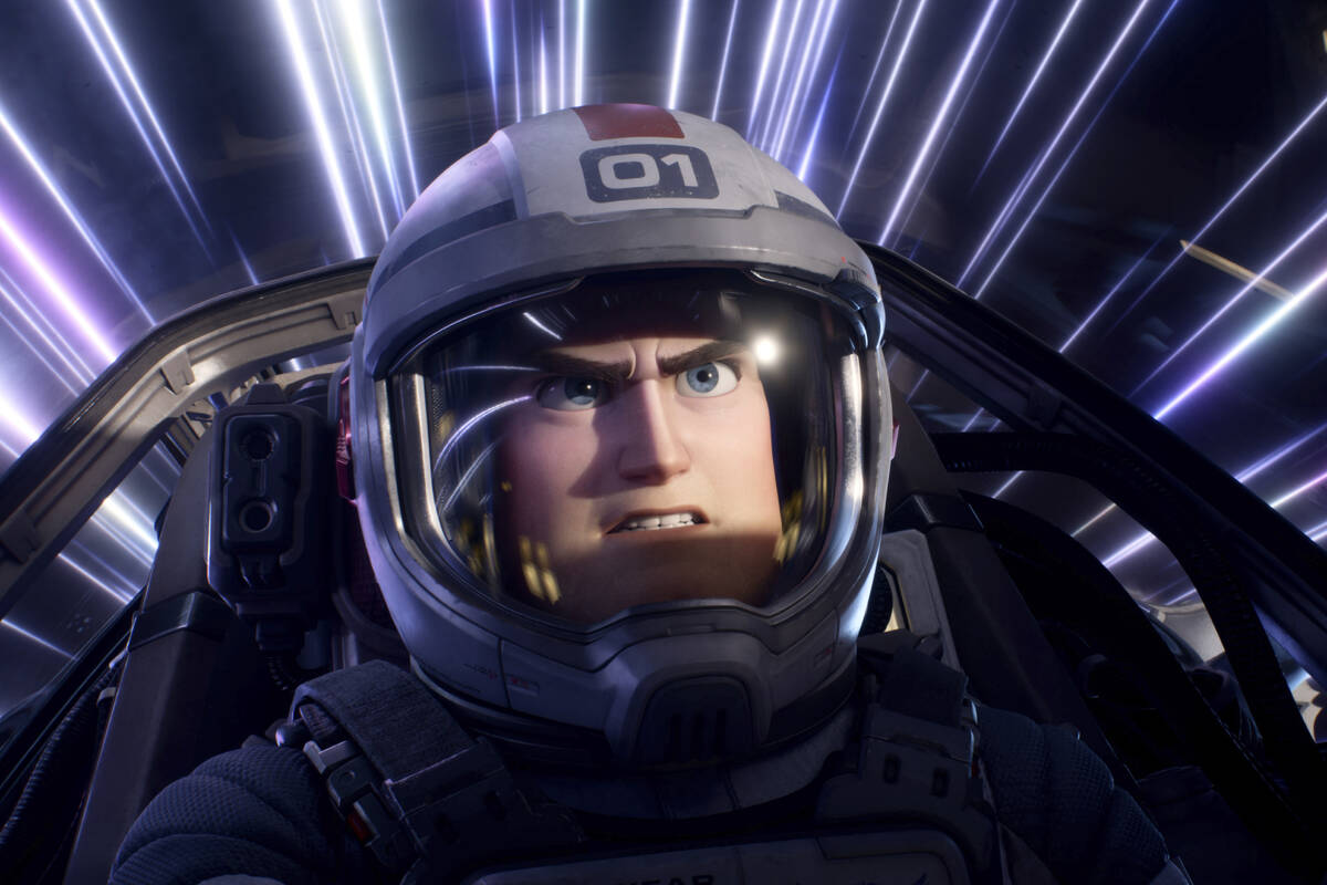 This image released by Disney/Pixar shows character Buzz Lightyear, voiced by Chris Evans, in a ...