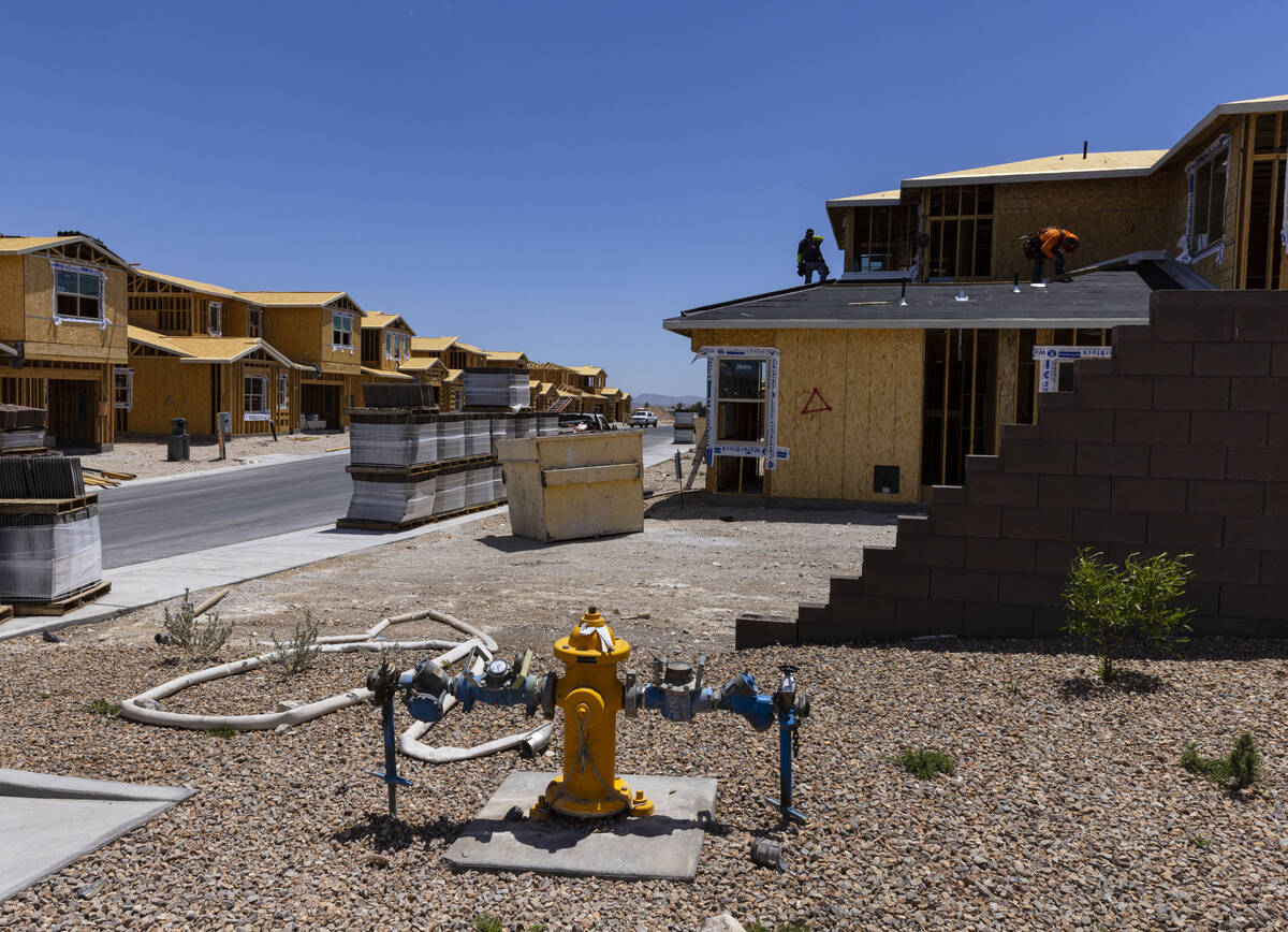 Construction is underway for a new housing community at Acadia Ridge on Far Hills Avenue and th ...