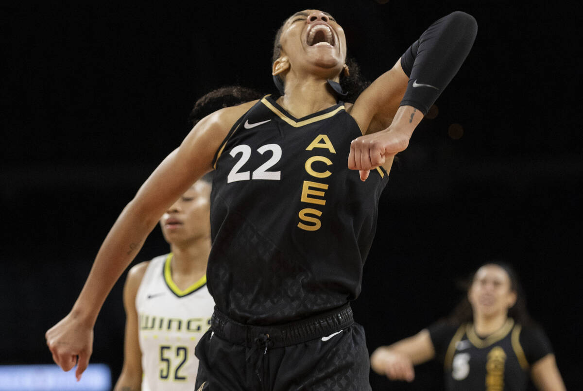 Aces forward A'ja Wilson (22) celebrates a big offensive play in the second half during a WNBA ...