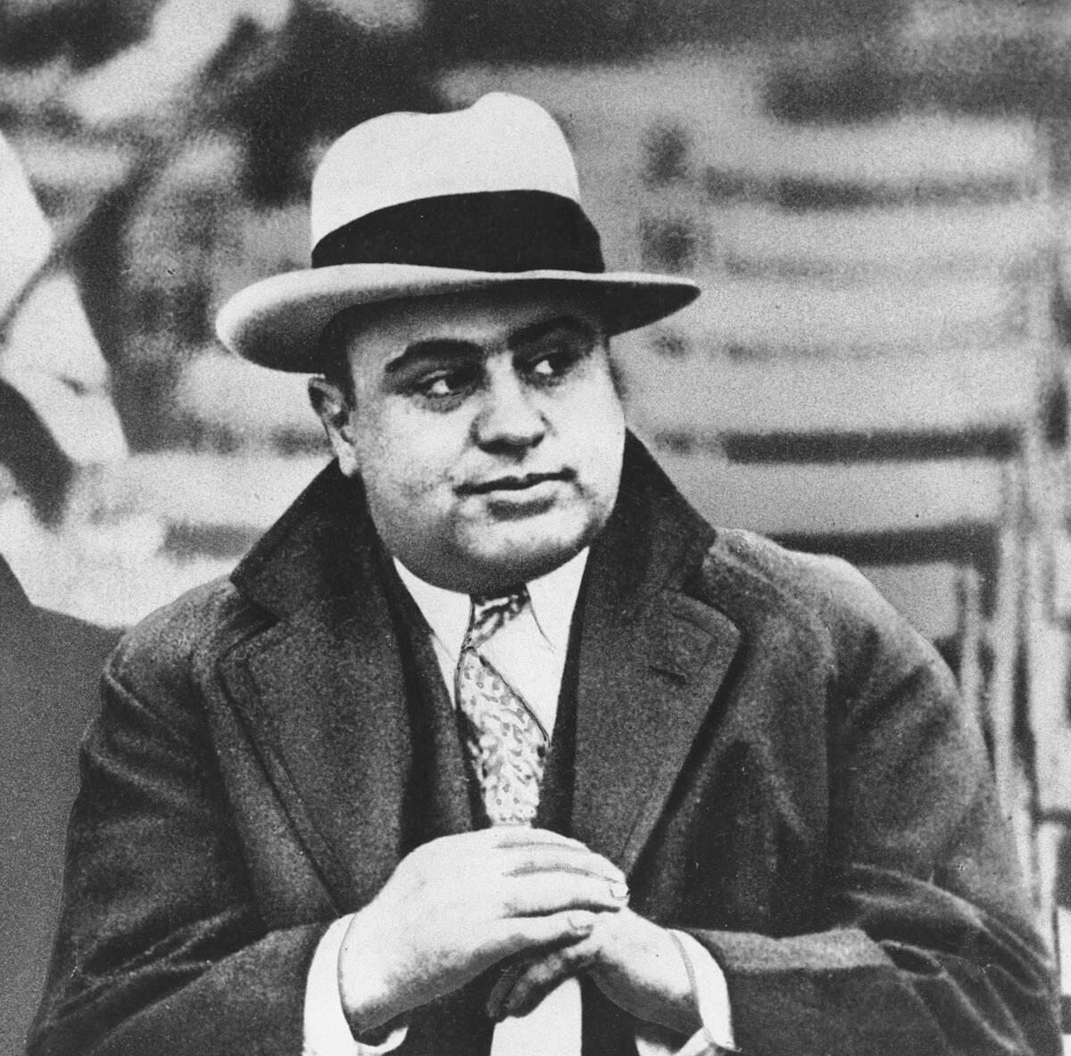 In this Jan. 19, 1931 file photo, Chicago mobster Al Capone is seen at a football game in Chica ...