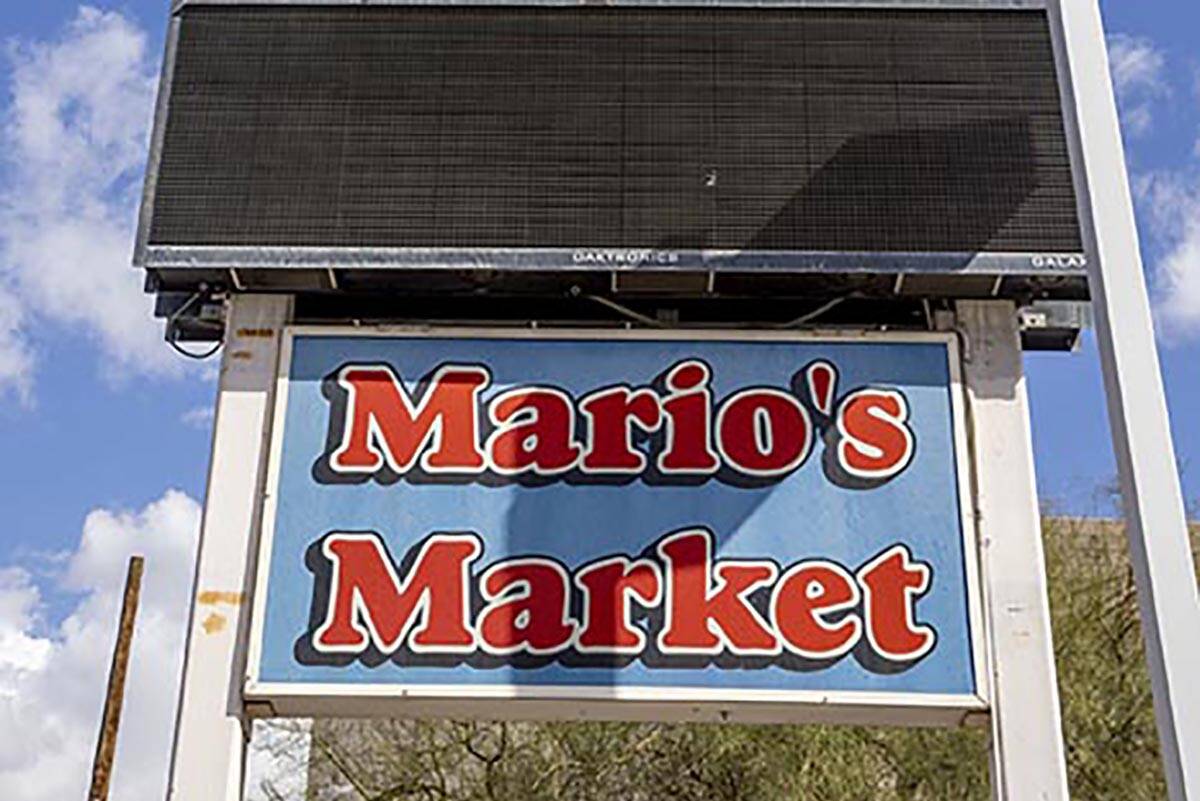 Signage in the parking lot of Mario's Westside Market with a possible move soon into the nearby ...