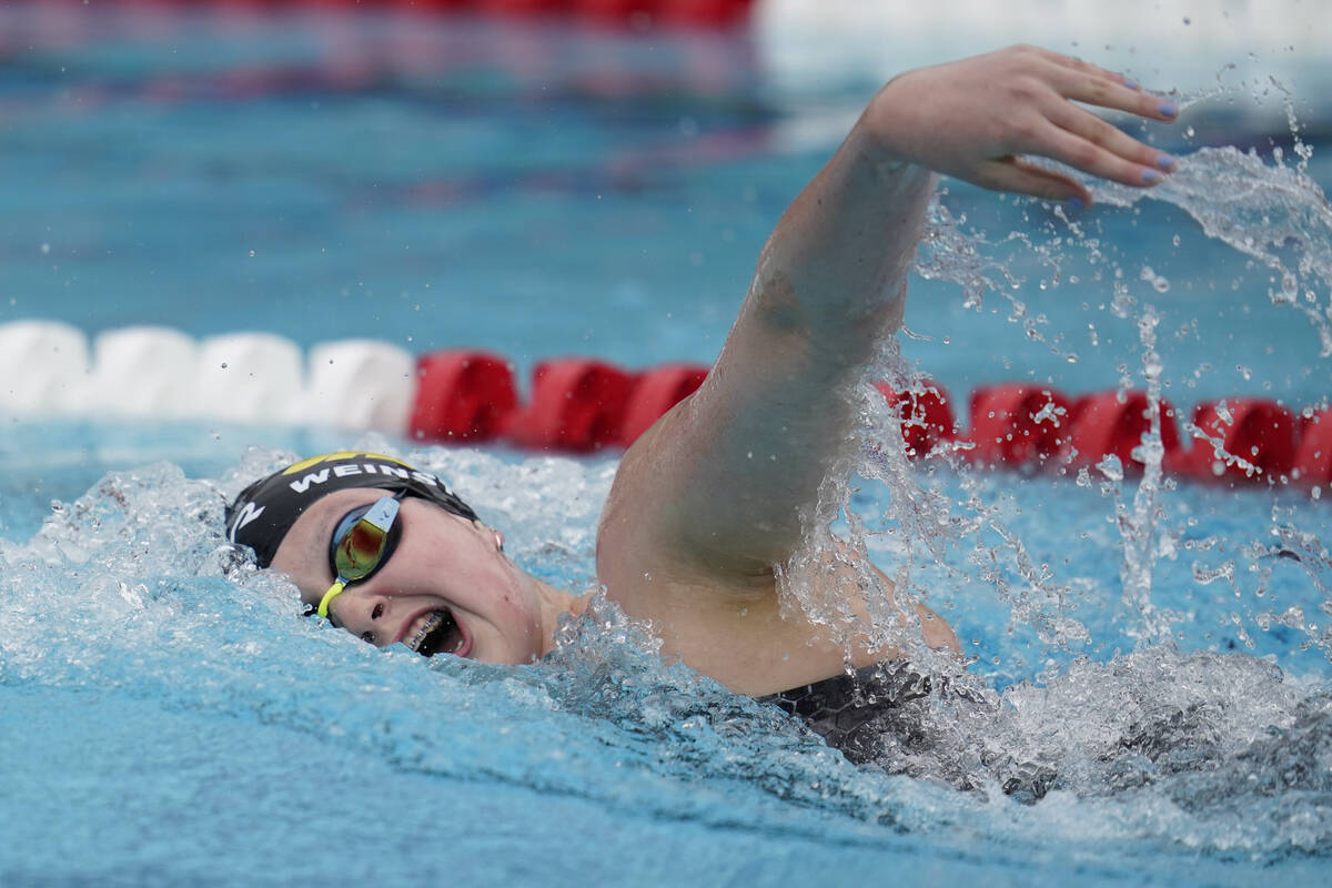 Claire Weinstein competes in the women's 100-meter prelim at the TYR Pro Swim Series swim meet ...