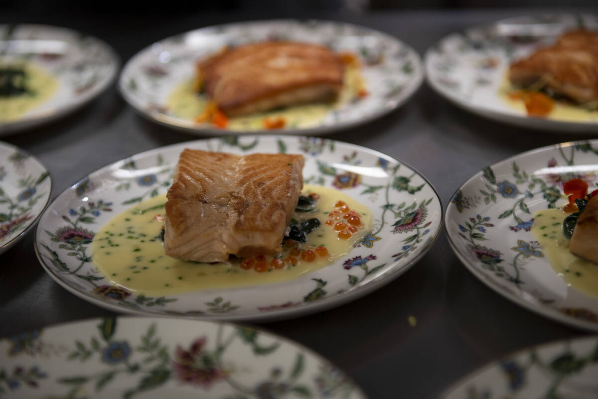 The third course, Madre i Hijo – chargrilled salmon with caviar sabayón and Bloomsdale spina ...