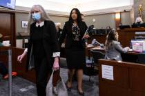 Linda Cooney, left, leaves the courtroom with her attorney Sophie Salcedo, after her sentencing ...
