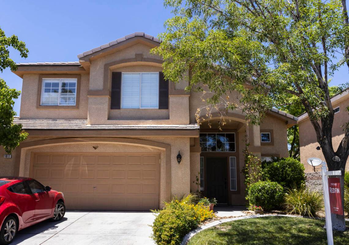 Redfin's for sale sign is posted outside a single family house at Novara Lane on Wednesday, Jun ...