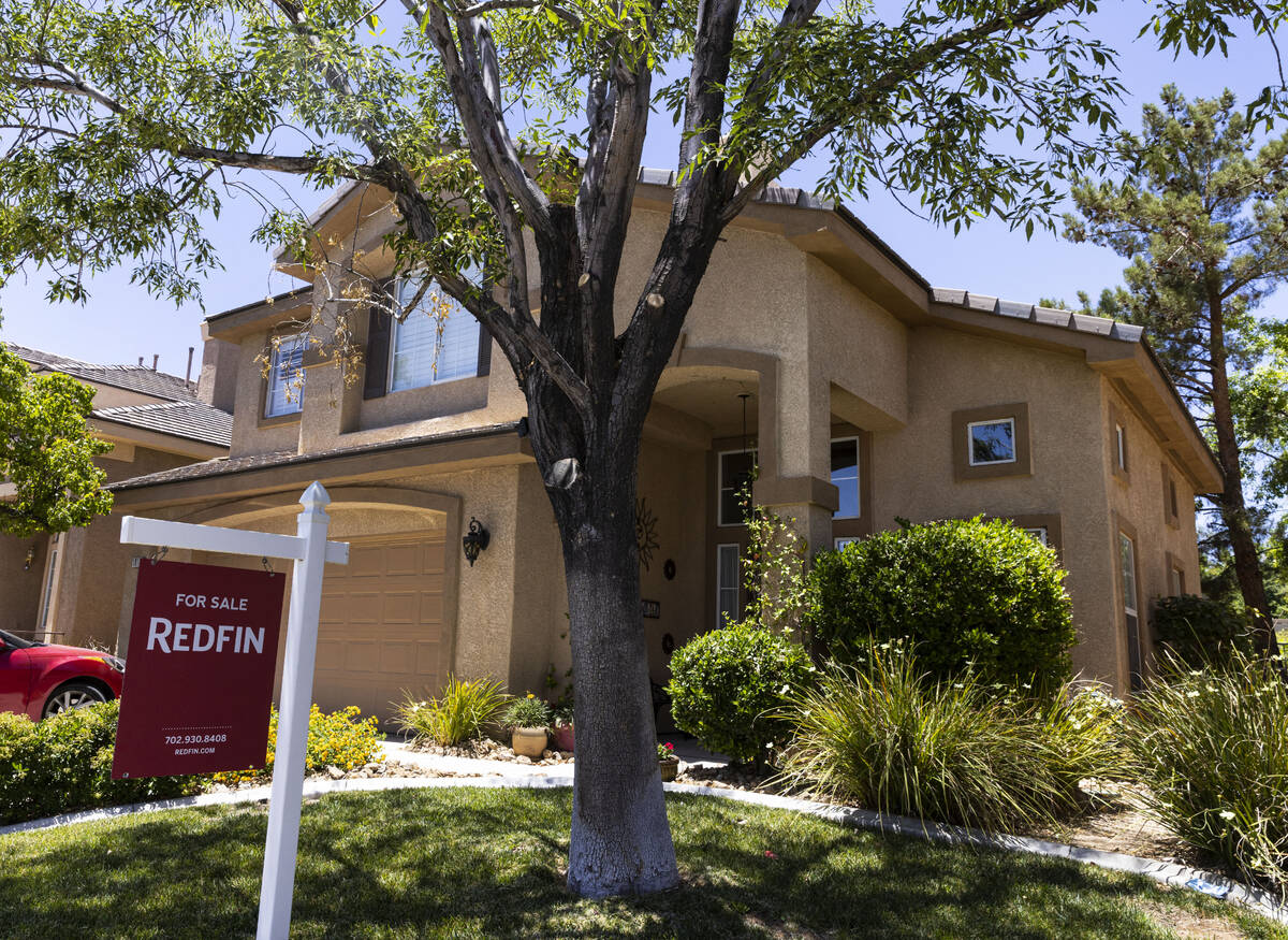 Redfin's for sale sign is posted outside a single family house at Novara Lane on Wednesday, Jun ...