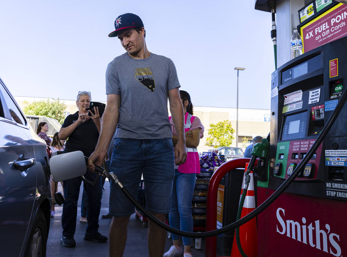 Golden Knights captain Mark Stone pumps gas to a customer at Smith’s Marketplace on Thur ...