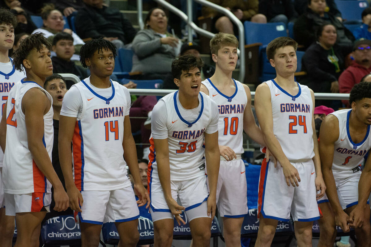 The Bishop Gorman bench during the NIAA Class 5A boys basketball state championship game agains ...