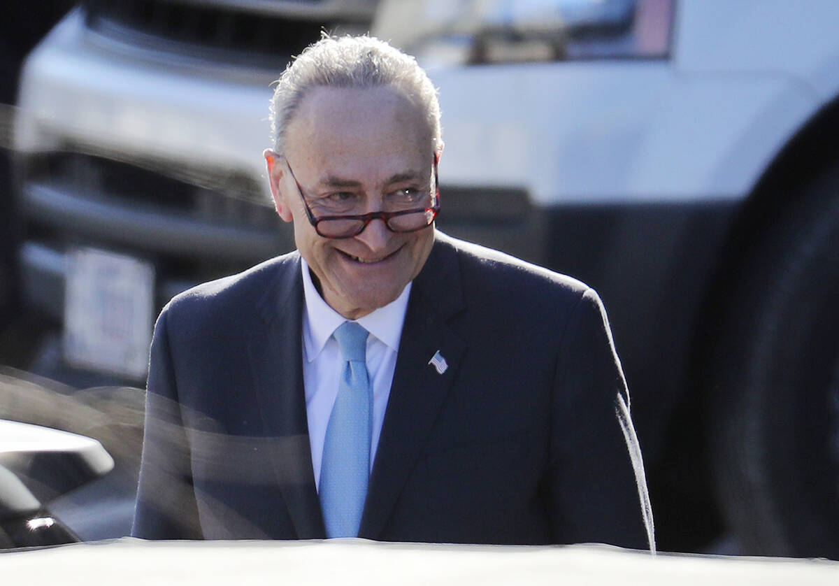 Senate Minority Leader Chuck Schumer of N.Y. walks to his vehicle following his meeting with Pr ...
