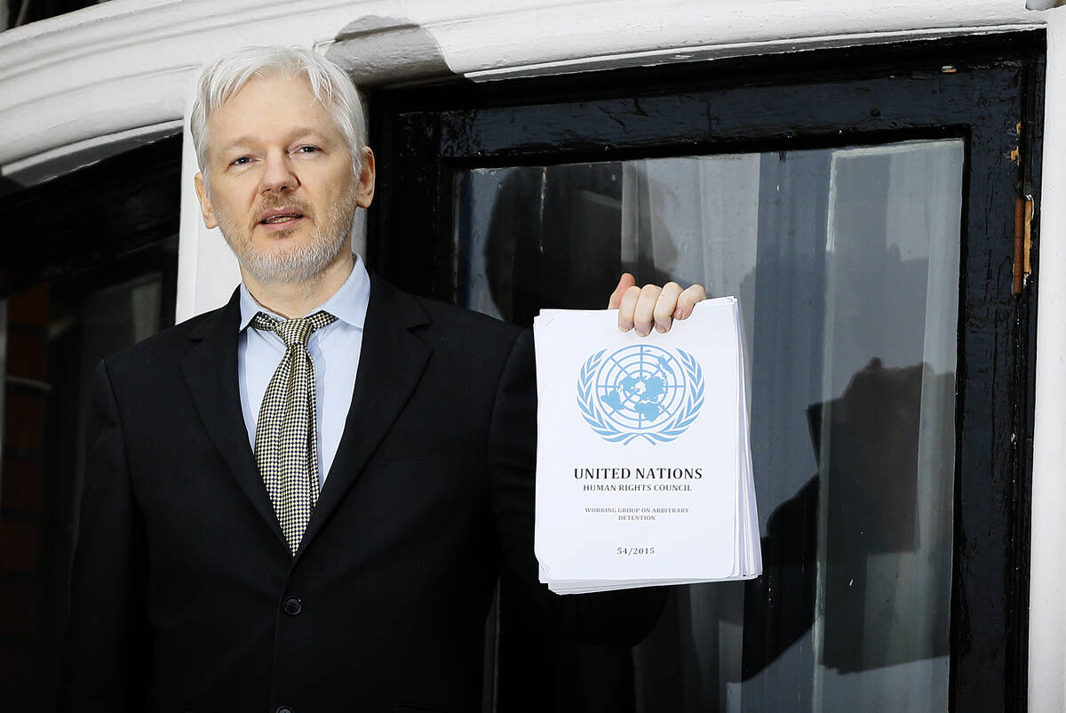 FILE - Wikileaks founder Julian Assange speaks on the balcony of the Ecuadorean Embassy in Lond ...