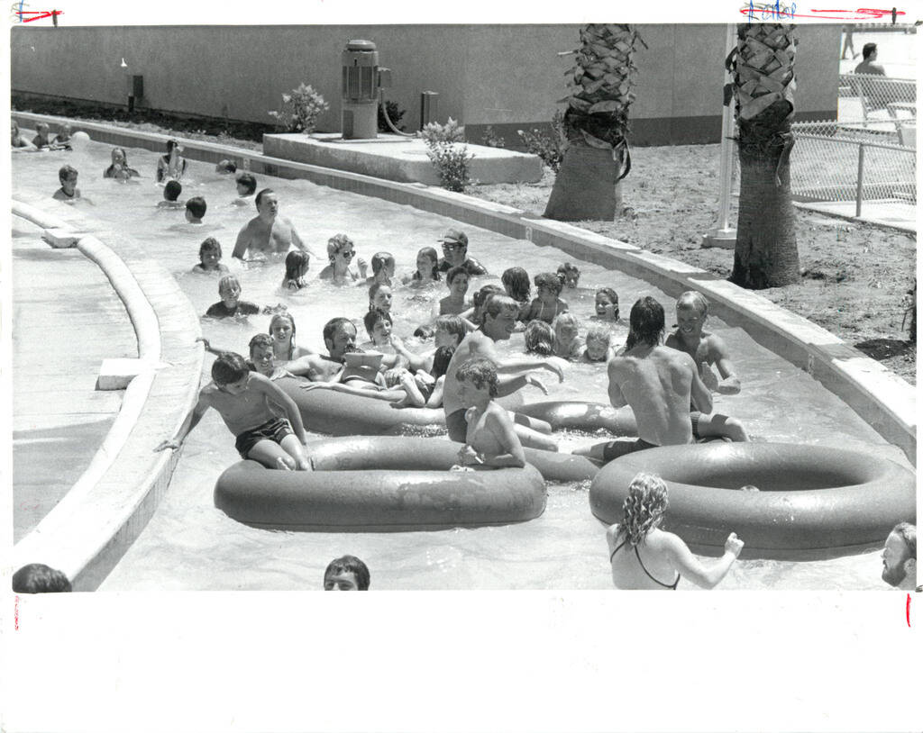 Visitors ride inner tubes on the lazy river at Wet 'n' Wild on Las Vegas Boulevard in 1985. (La ...