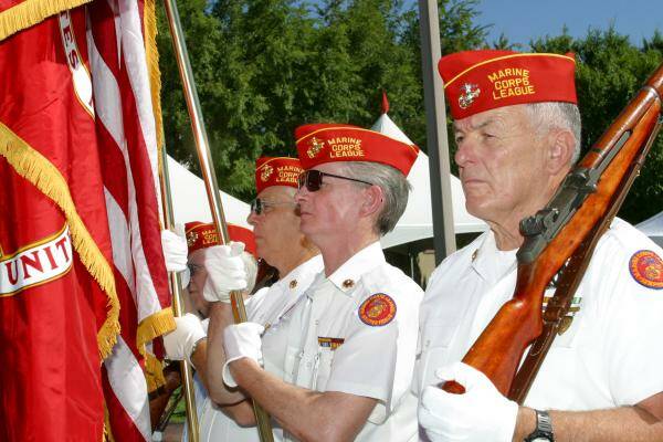 The Marine Corps League Greater Nevada Detachment #186 color guard leads the Summerlin Council ...