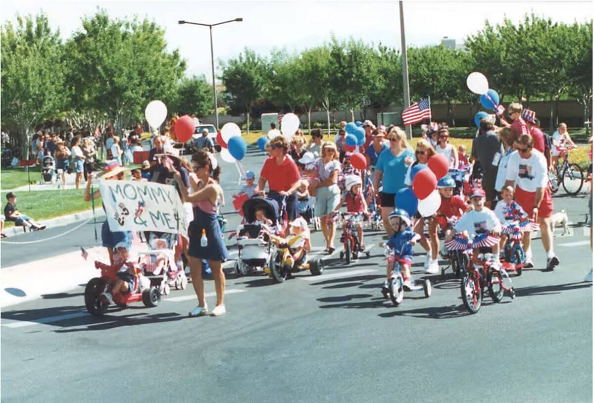 Mommy and Me West members walk in the 2001 Summerlin Council Patriotic Parade. (Courtesy of Sum ...