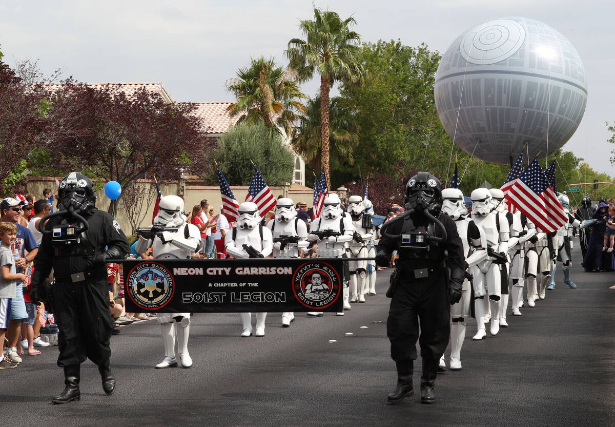 Members of the Neon City Garrison of the 501st Legion march at the 2012 Summerlin Council Patri ...