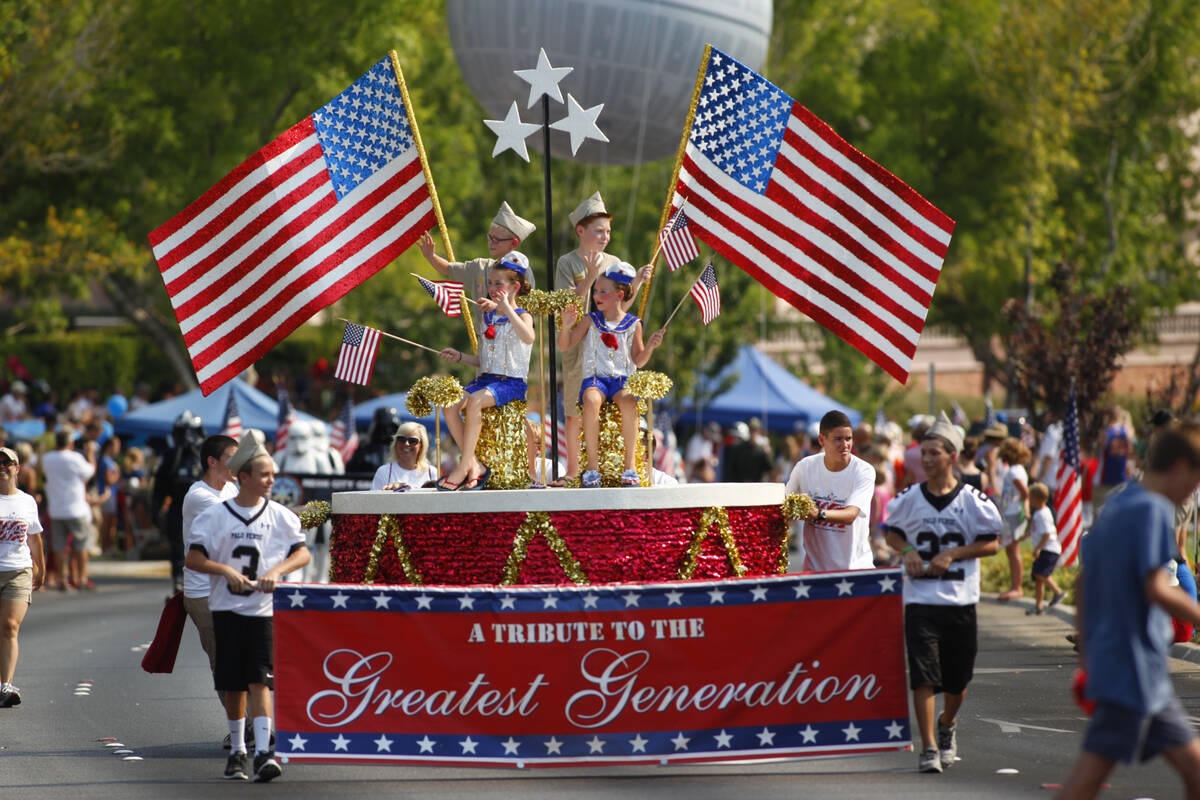 A float representing "A Tribute to the Greatest Generation" is seen during the 2013 Summerlin C ...