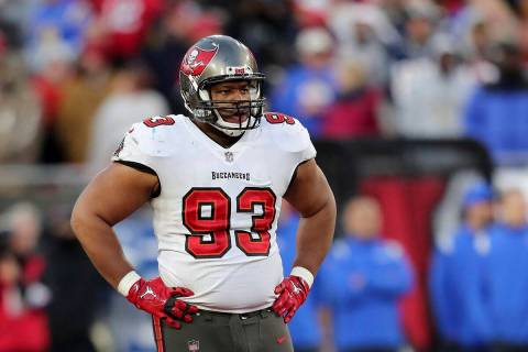 Tampa Bay Buccaneers defensive end Ndamukong Suh (93) looks on during a NFL divisional playoff ...