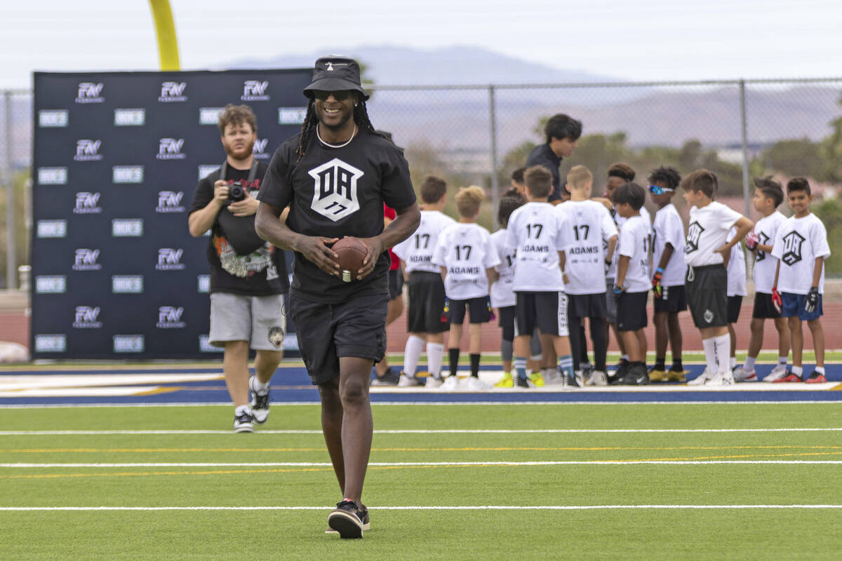 Raiders wide receiver Davante Adams participates at his youth football camp at Spring Valley Hi ...