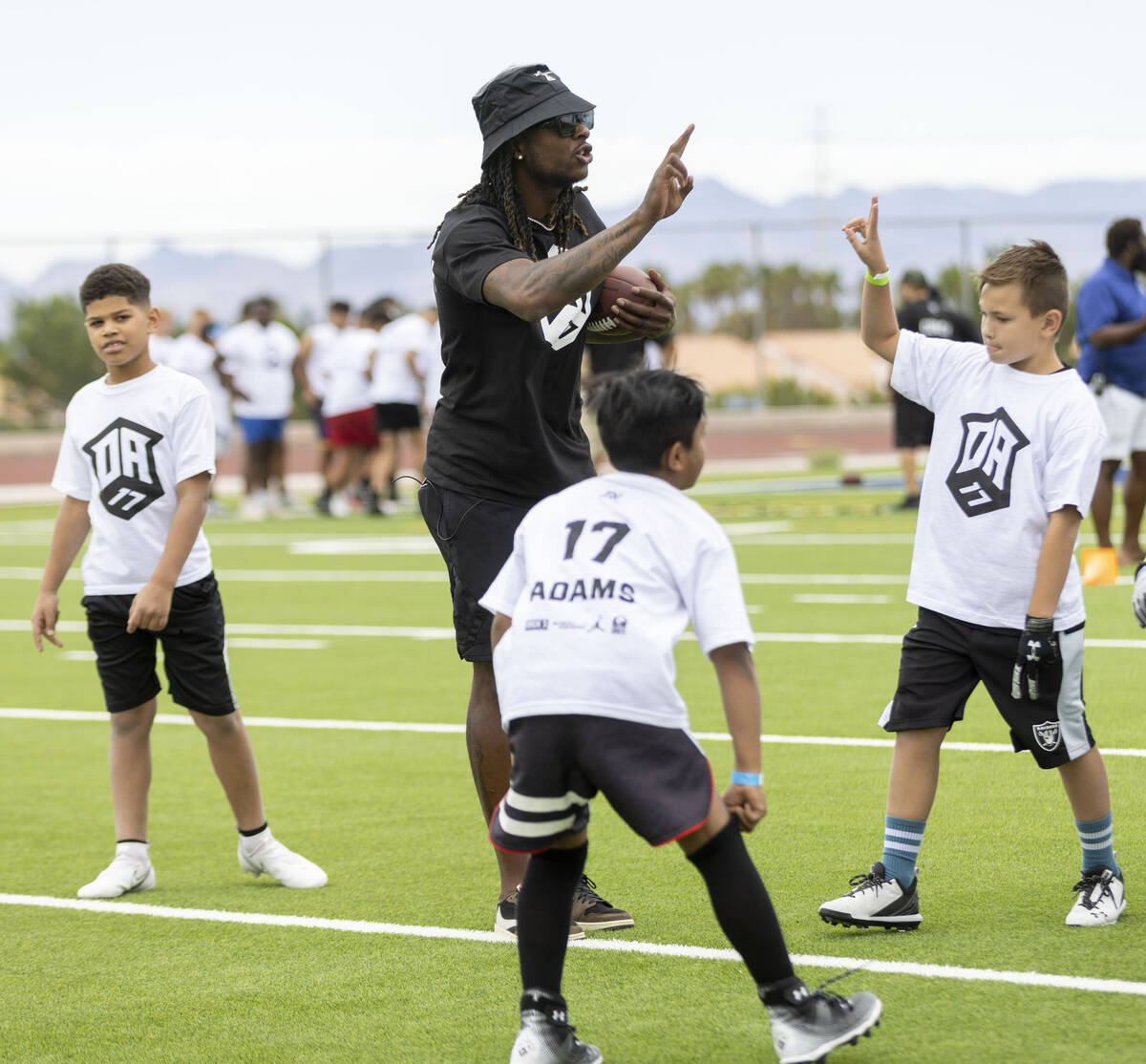 Raiders wide receiver Davante Adams participates in his youth football camp at Spring Valley Hi ...