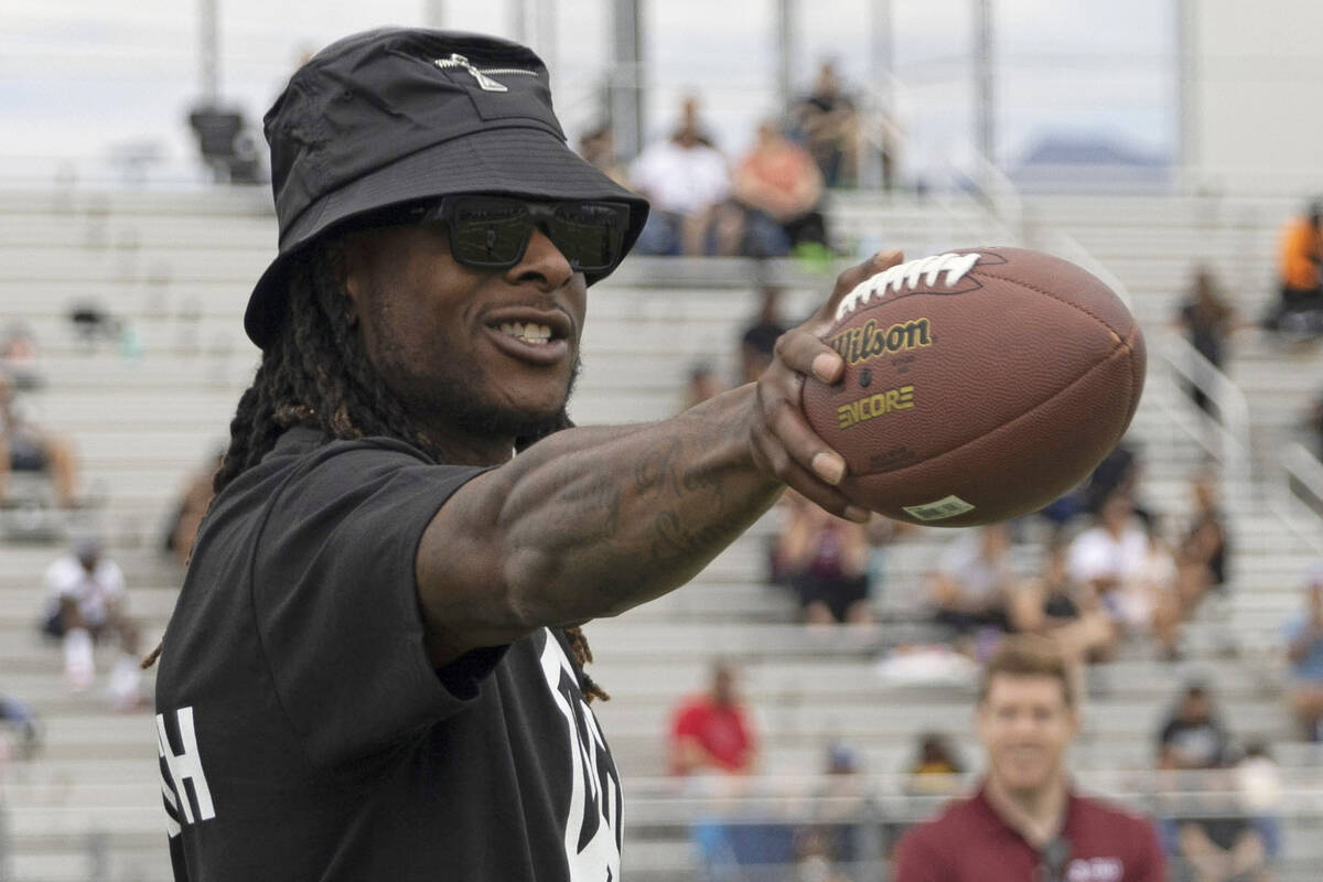 Raiders wide receiver Davante Adams participates in his youth football camp at Spring Valley Hi ...