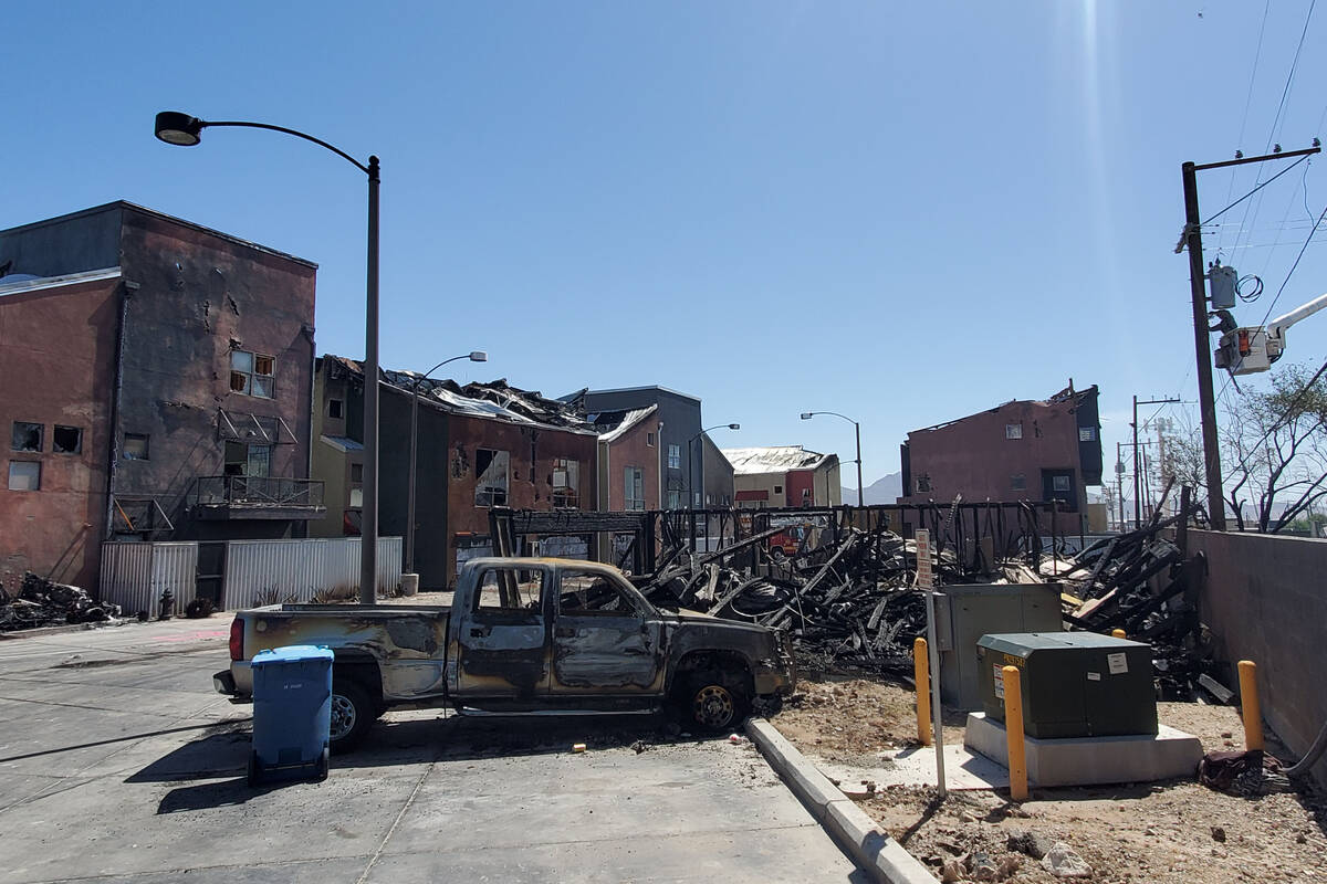 Damaged buildings are seen after a massive fire, Sunday, June 19, 2022, in downtown Las Vegas. ...