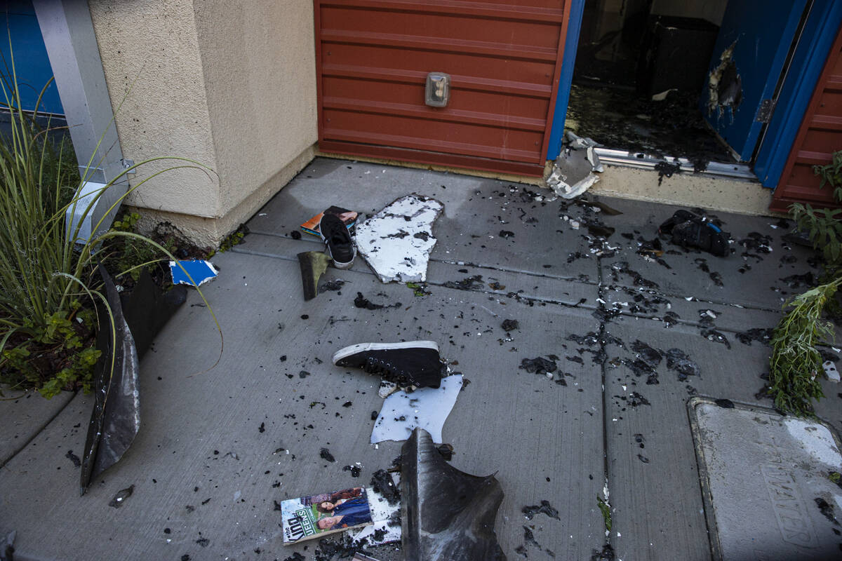Damage and debris at the scene where a fire damaged or destroyed at least 10 buildings at a con ...