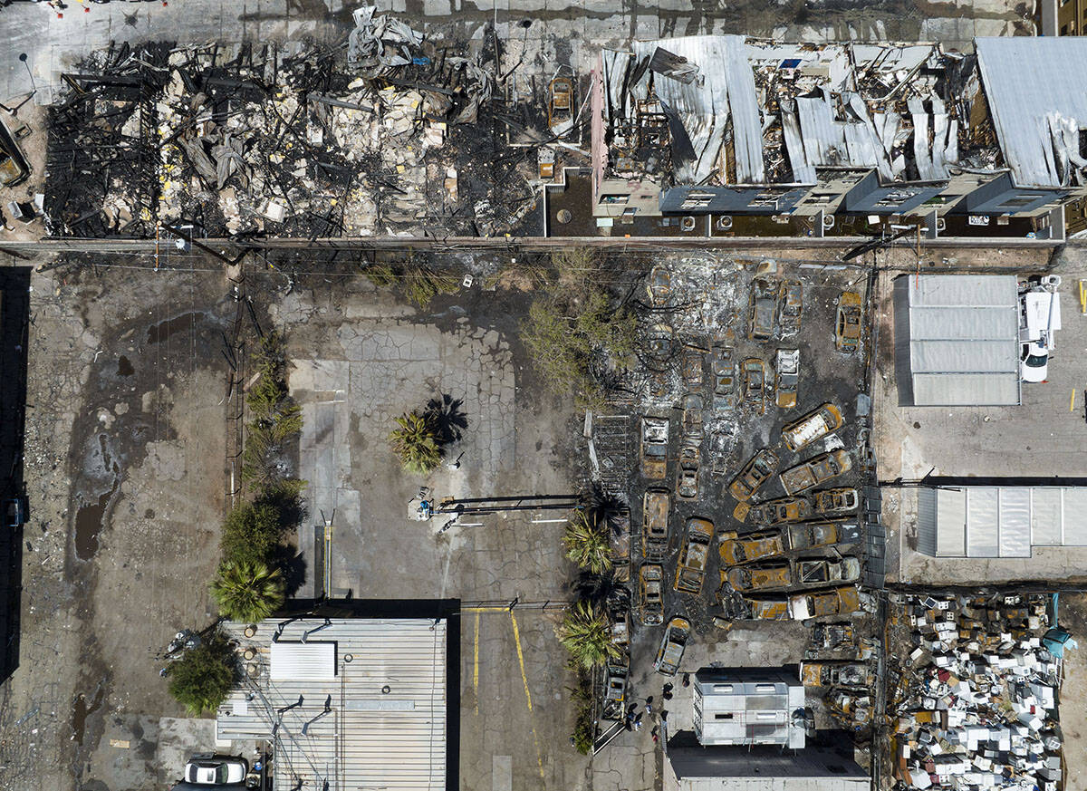 More than 30 vehicles where destroyed after a fire damaged or destroyed at least 10 buildings a ...