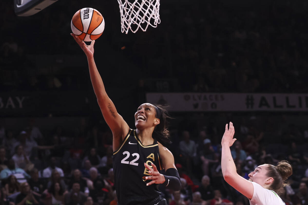 Las Vegas Aces forward A'ja Wilson (22) lays up the ball against the Minnesota Lynx during the ...